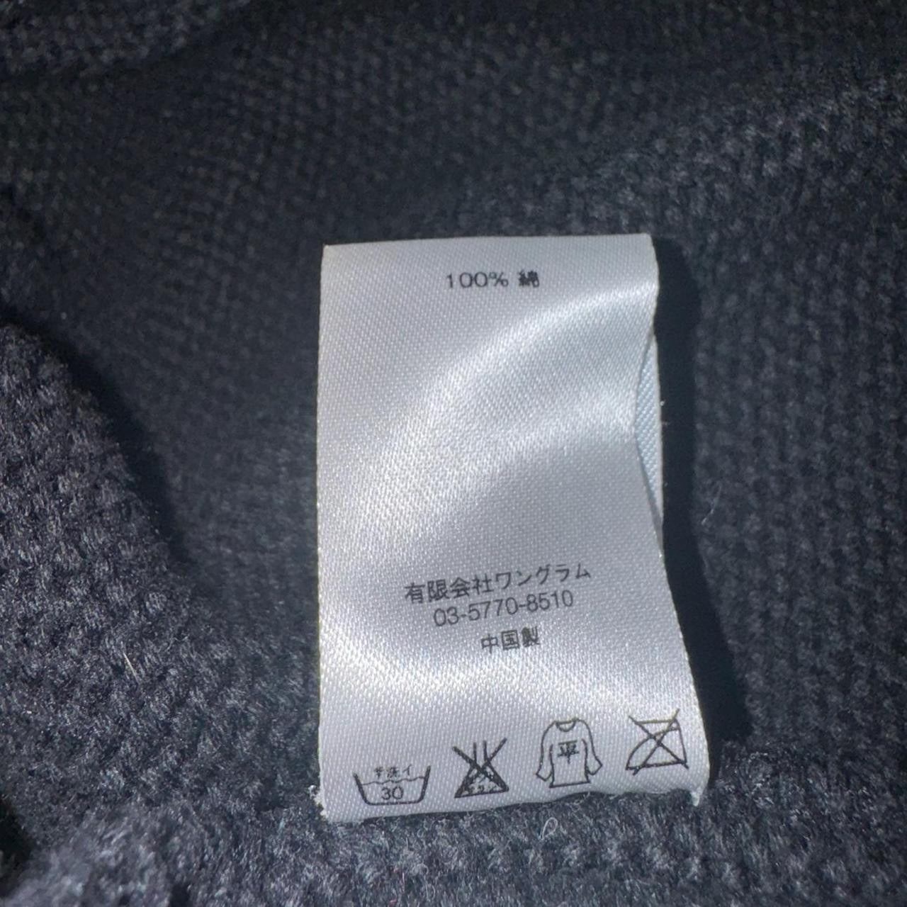 Supreme Quarter-Zip Sweater